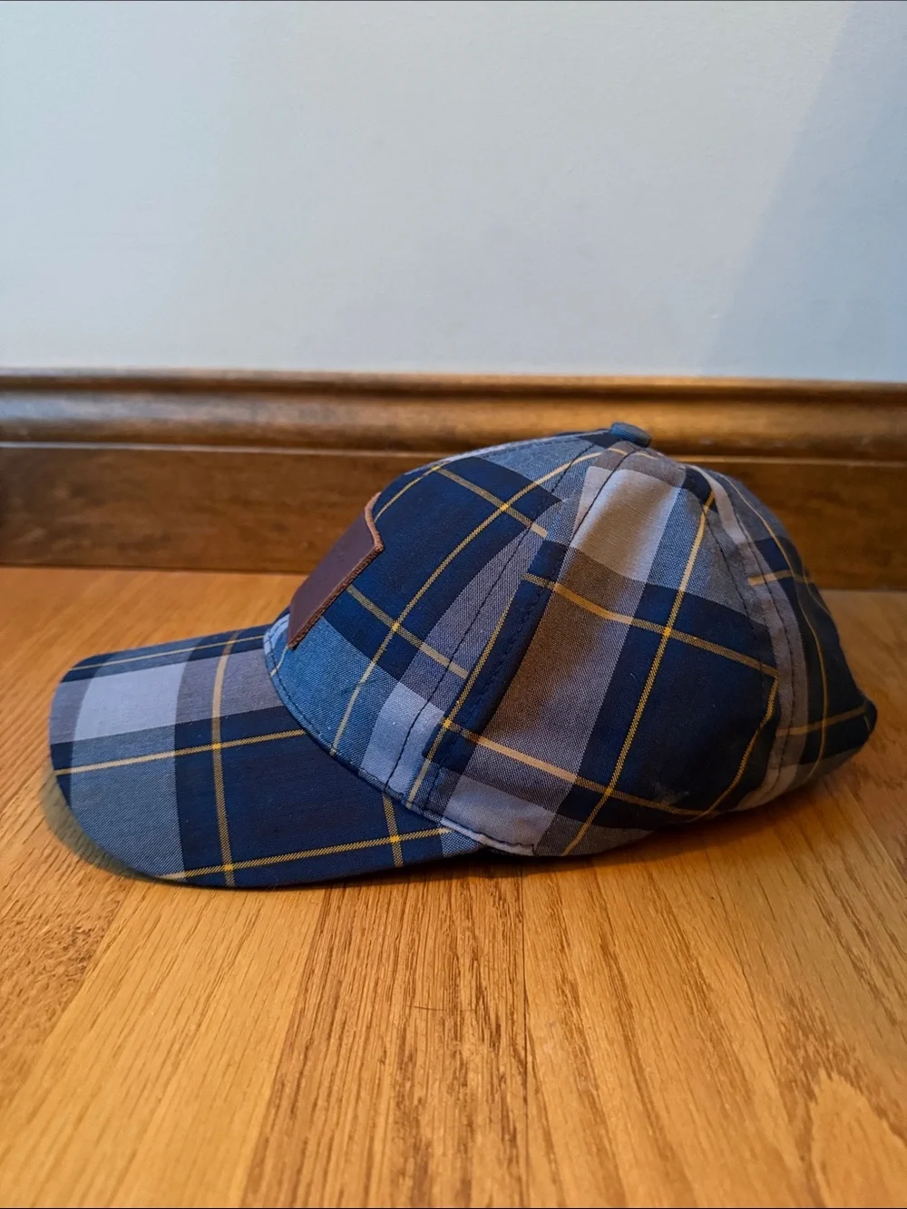 Love your melon plaid hat with leather logo